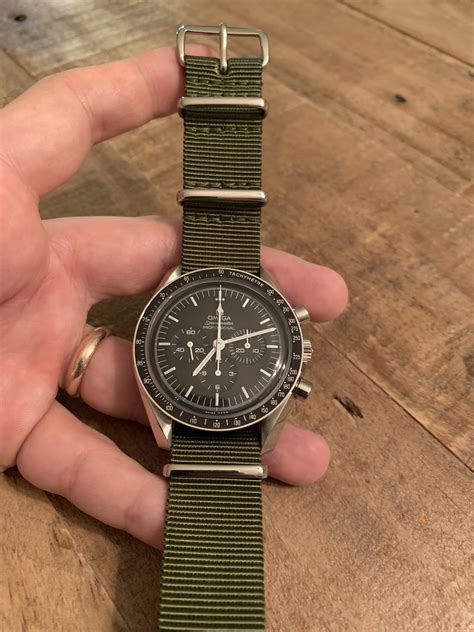 omega speedmaster racing on green nato